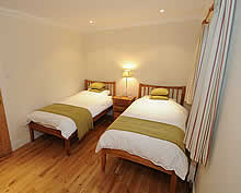 Twin bedroom in The Firs
